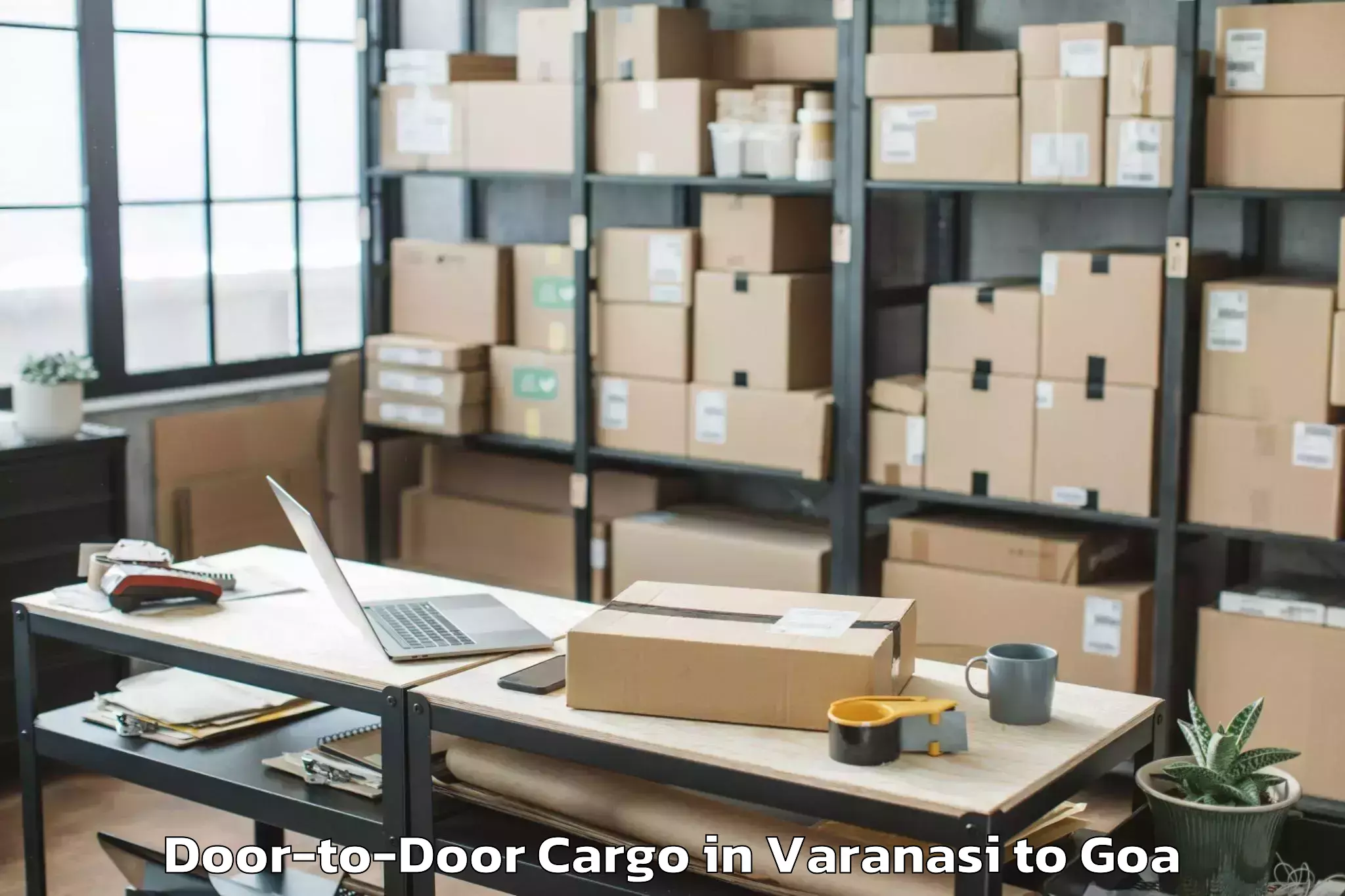 Book Varanasi to Chandor Door To Door Cargo Online